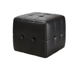 Black pouf with tufted design